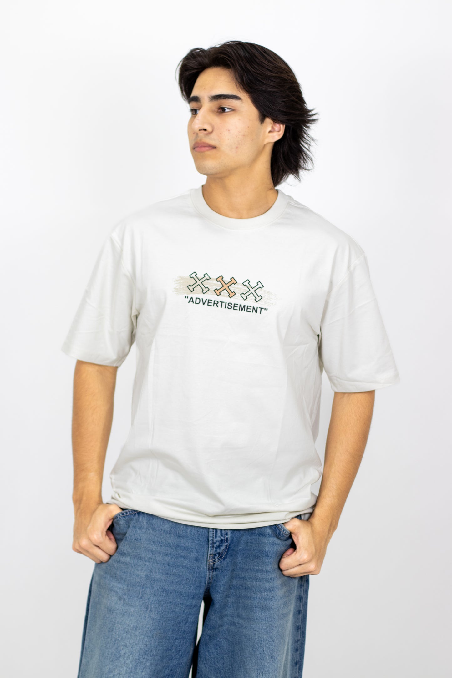 PLAYERA OVERSIZE ESTAMPADO ADVERTISEMENT